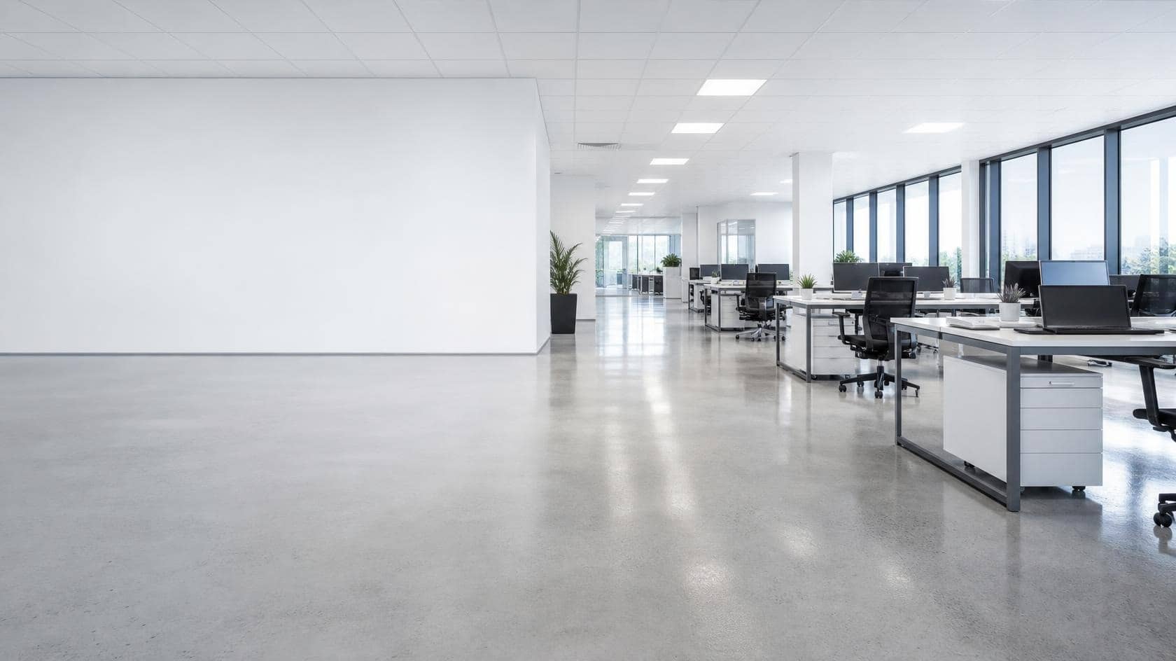 Three freshly serviced Australian commercial interiors: an office floor, a retail interior and a warehouse mezzanine